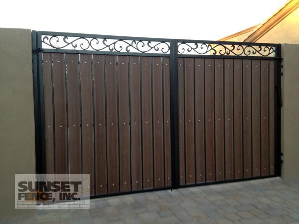 A double gate with wood and metal accents.